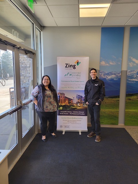 zing credit union with a centennial lending sign.
